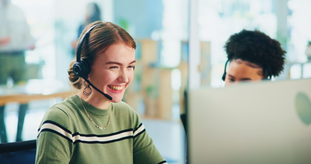 Consultant, business women and excited with computer for telemarketing, sale commission and pride.