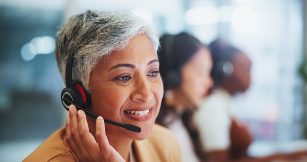 Business people, telemarketing and call center with customer service, woman and contact us. Group,