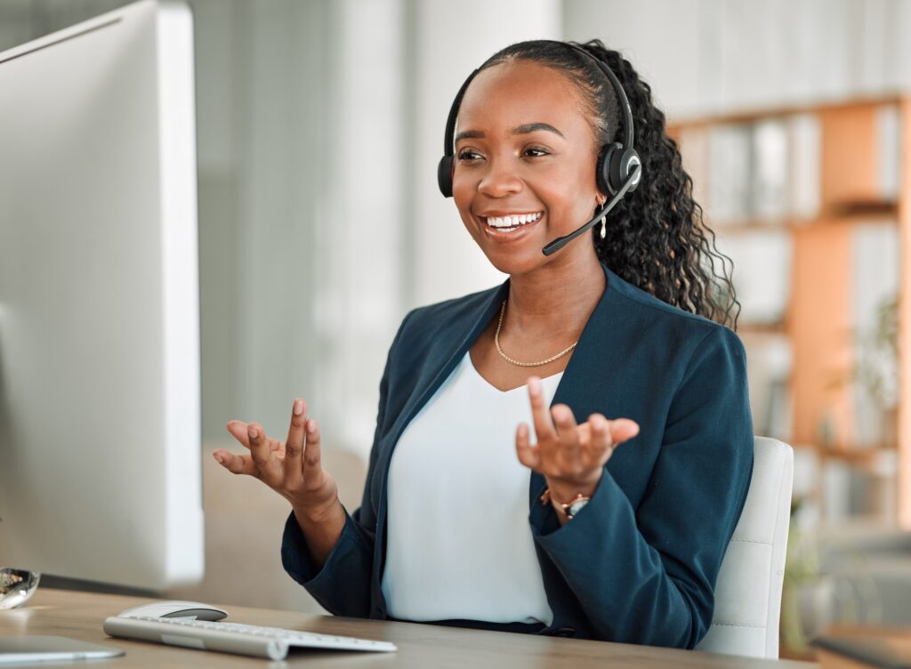 Computer, happy or black woman with headphones in call center for ecommerce or telemarketing advice