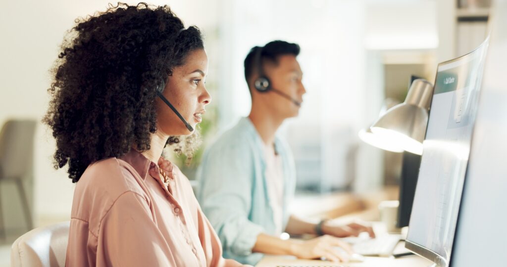 Telemarketing, black woman and crm worker on a consultation at call center with computer. Consultan