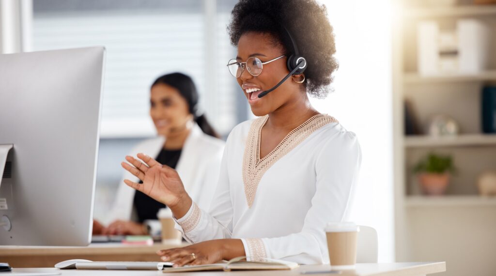Black woman, call center and consulting on computer with headset for telemarketing, customer servic